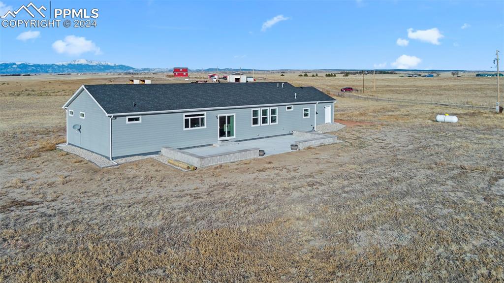 9393 North Log Road Calhan, CO 80808 - Photo 42 of 49 an aerial view of a house
