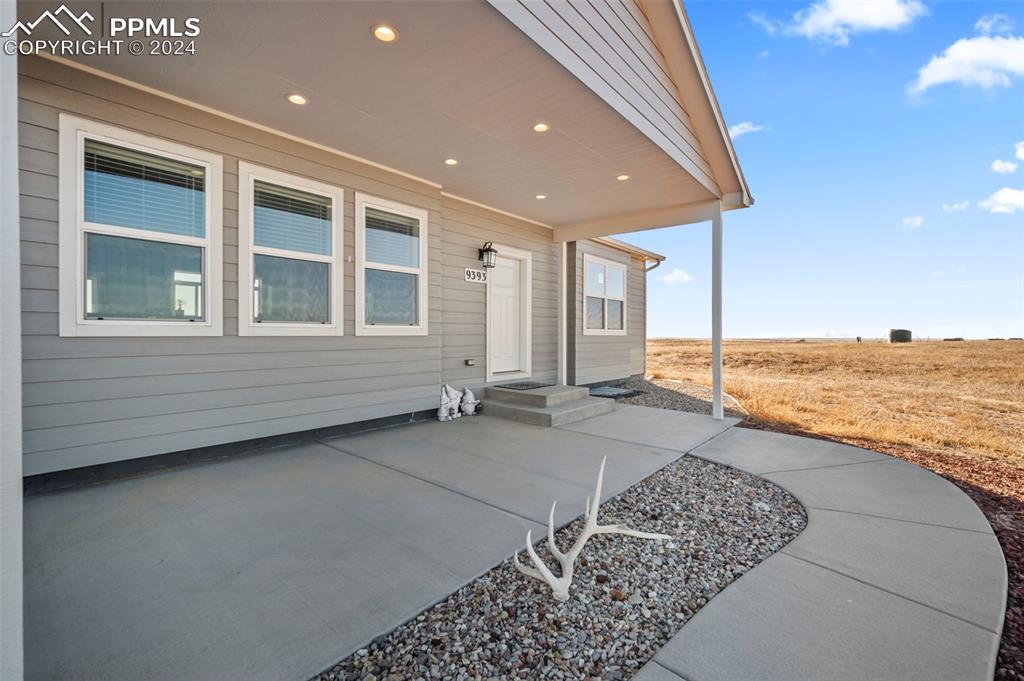 9393 North Log Road Calhan, CO 80808 - Photo 5 of 49 a view of an ocean & kitchen