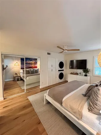 a kitchen with stainless steel appliances granite countertop a refrigerator stove top oven and sink