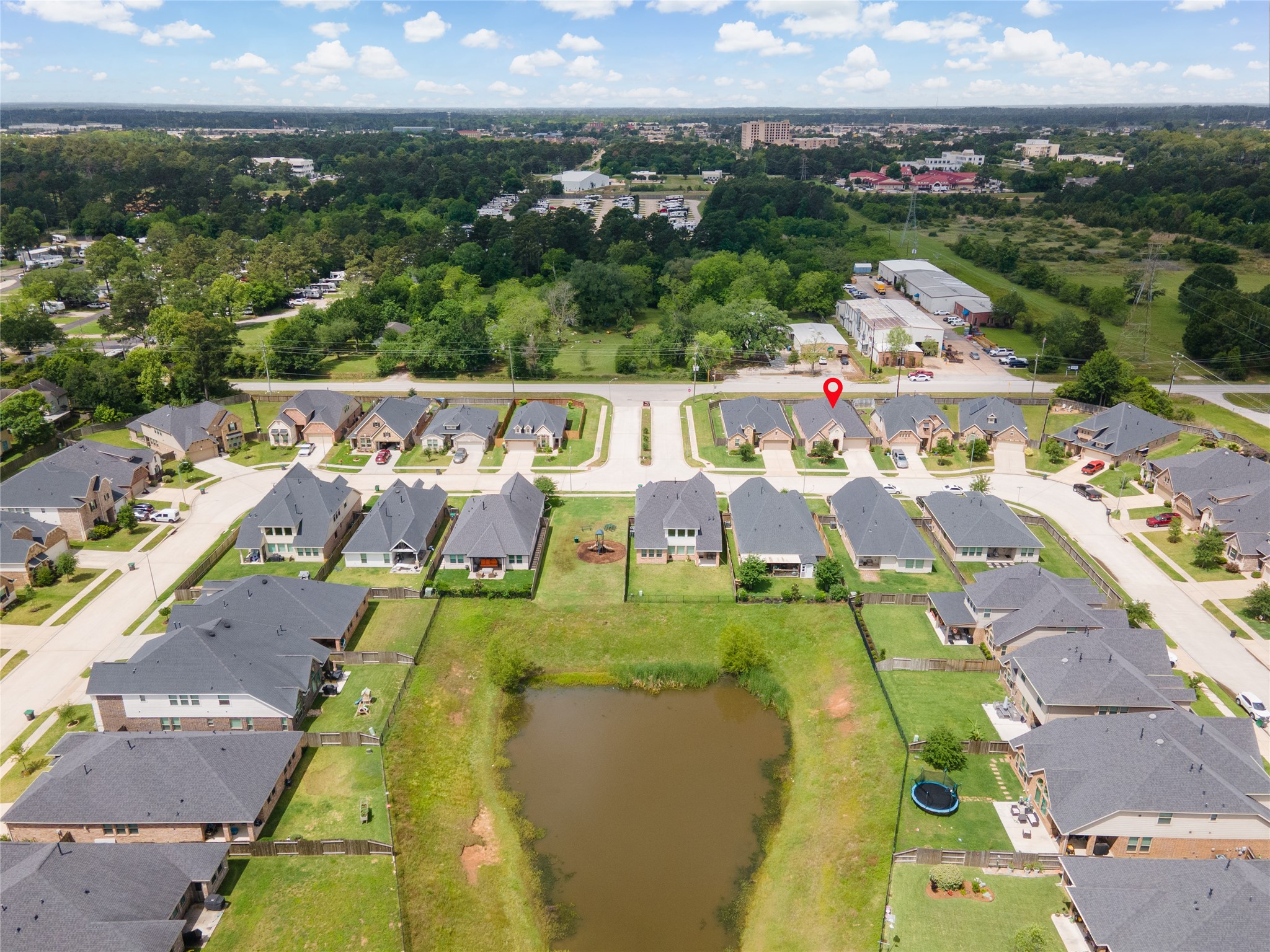 1314 Orchard Ridge Lane Tomball, TX 77375 - Photo 34 of 35 Located in a quaint pocket neighborhood, this home offers a more intimate setting with a cohesive streetscape.