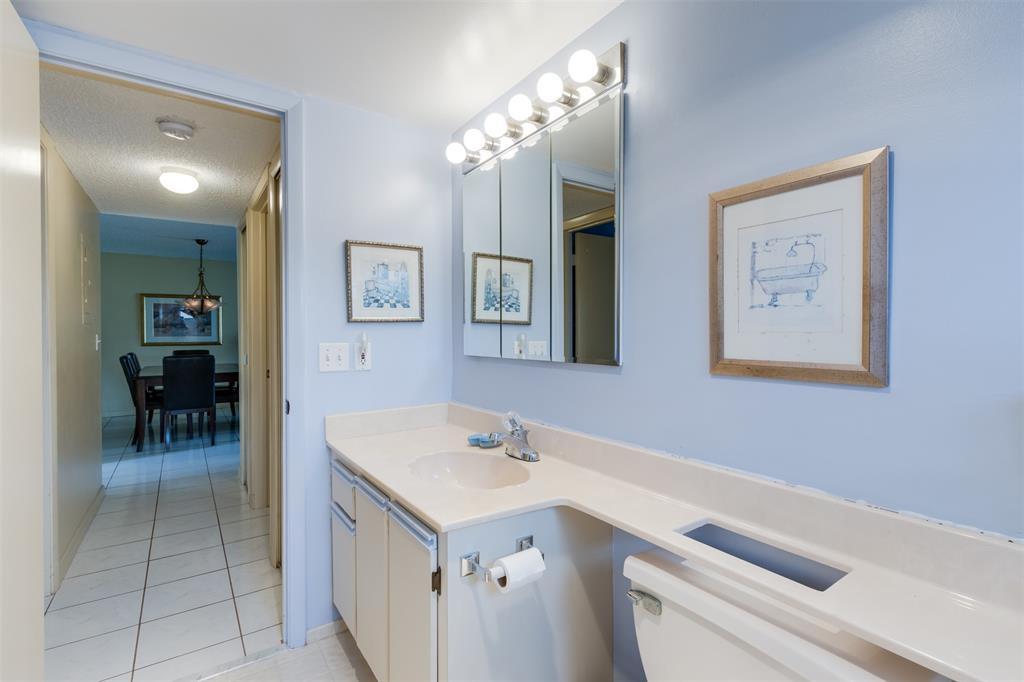 190 Southeast 5th Avenue, Unit 108 Dania Beach, FL 33004 - Photo 19 of 40 a bathroom with a sink and a mirror