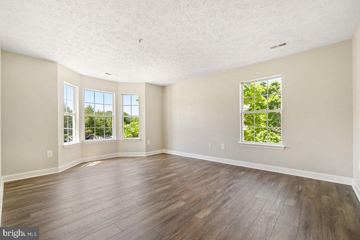 6101 Springwater Place, Unit 1203 Frederick, MD 21701 - Photo 15 of 36 Primary Bedroom