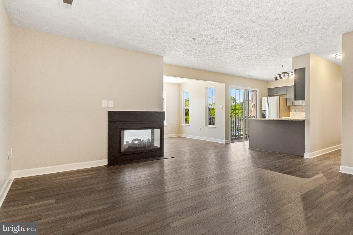 6101 Springwater Place, Unit 1203 Frederick, MD 21701 - Photo 7 of 36 Living Room