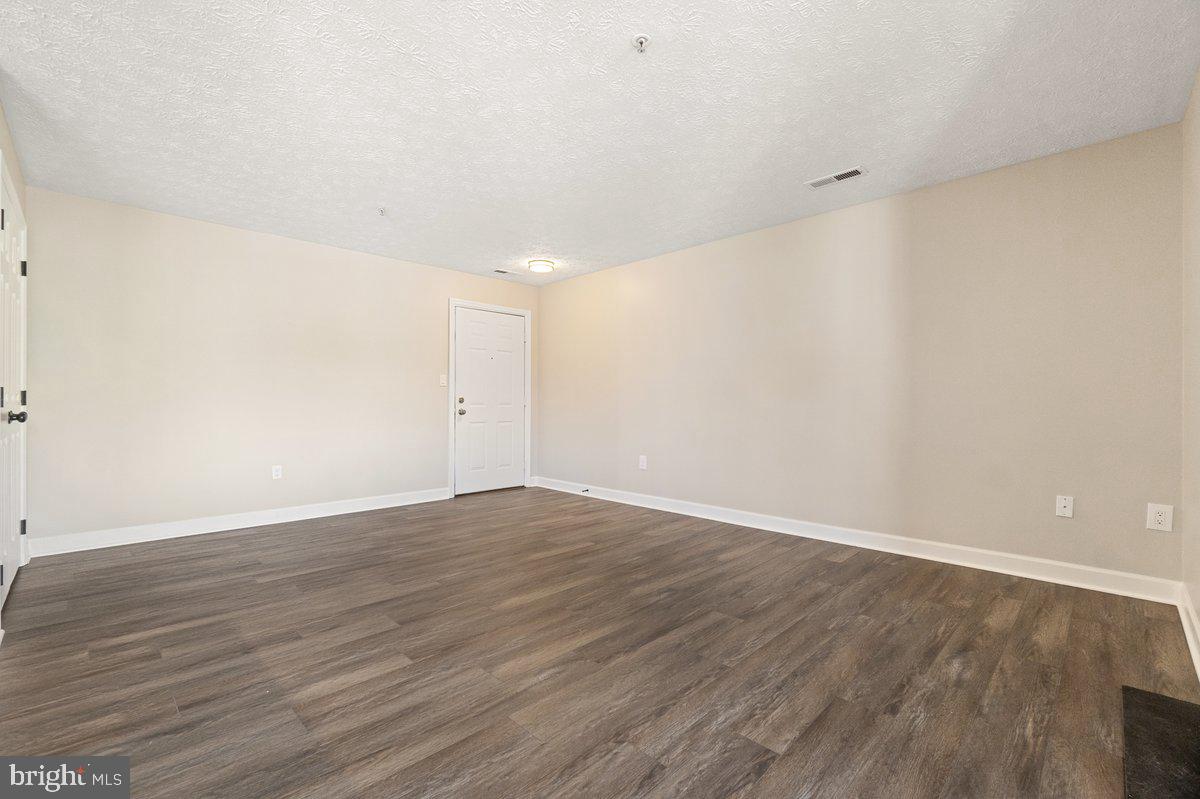 6101 Springwater Place, Unit 1203 Frederick, MD 21701 - Photo 9 of 36 Living Room