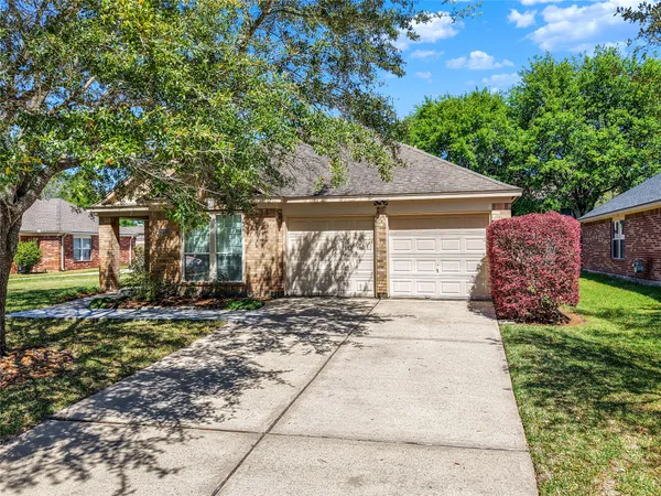 $309,000 | 26920 Carriage Manor Lane, Kingwood, TX 77339