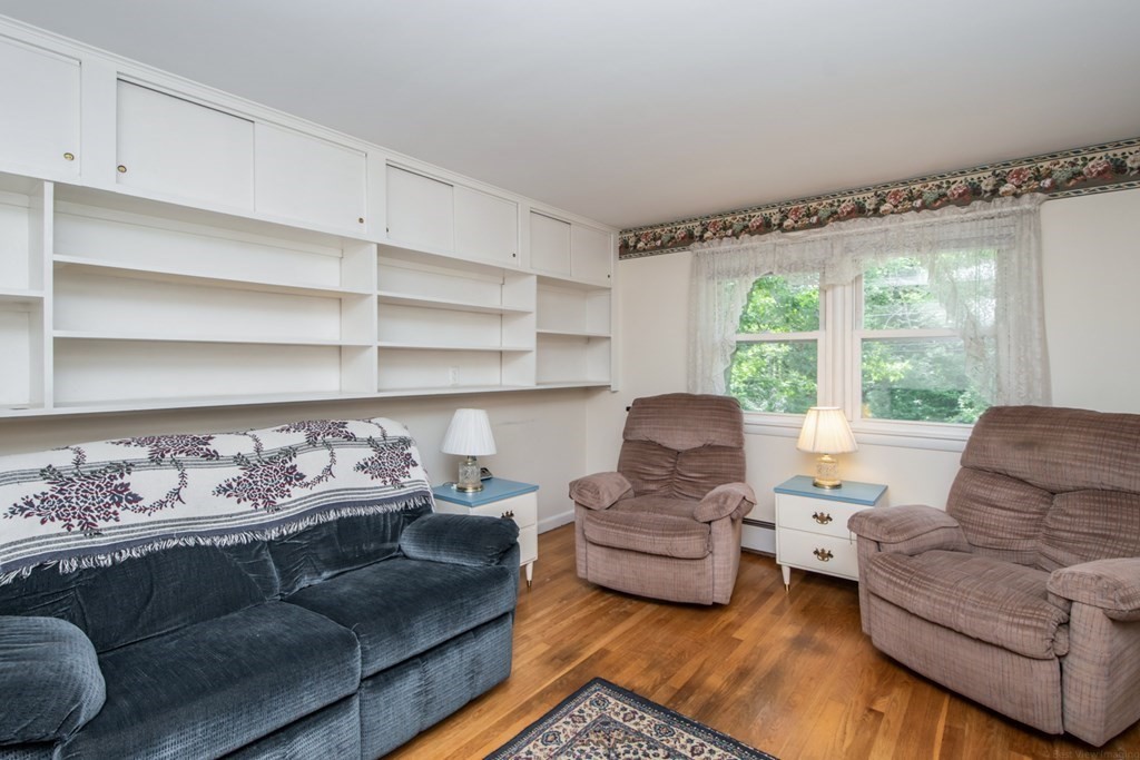 114 Arnold Road Sturbridge, MA 01518 - Photo 18 of 31 a living room with furniture and a large window