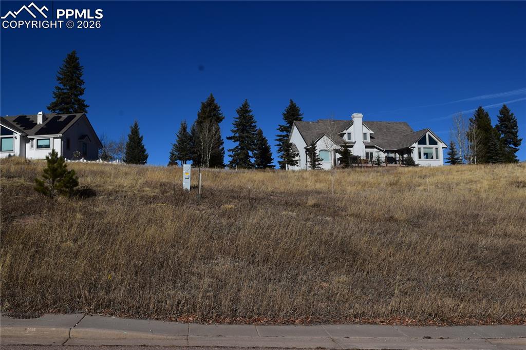 108 Allison Place Divide, CO 80814 - Photo 12 of 18 a view of a house with a yard