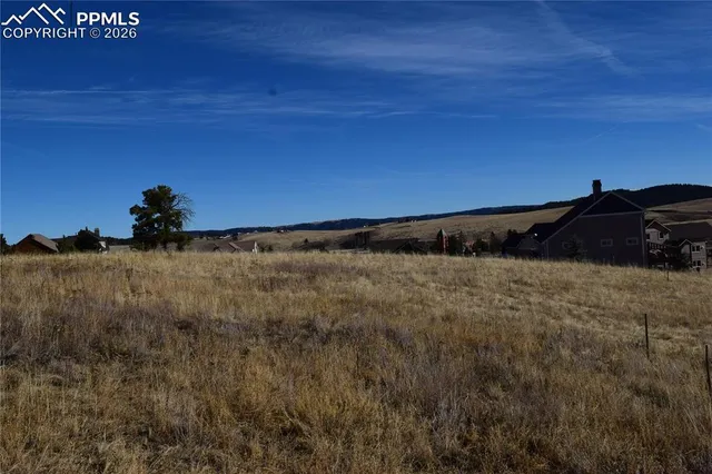 a view of street with an ocean view