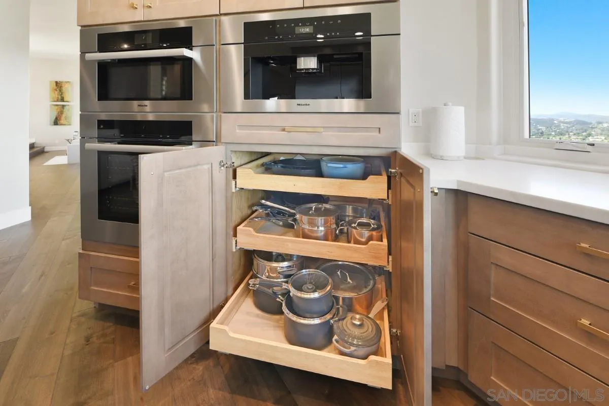 15484 Markar Road Poway, CA 92064 - Photo 18 of 75 a kitchen with a stove and a microwave