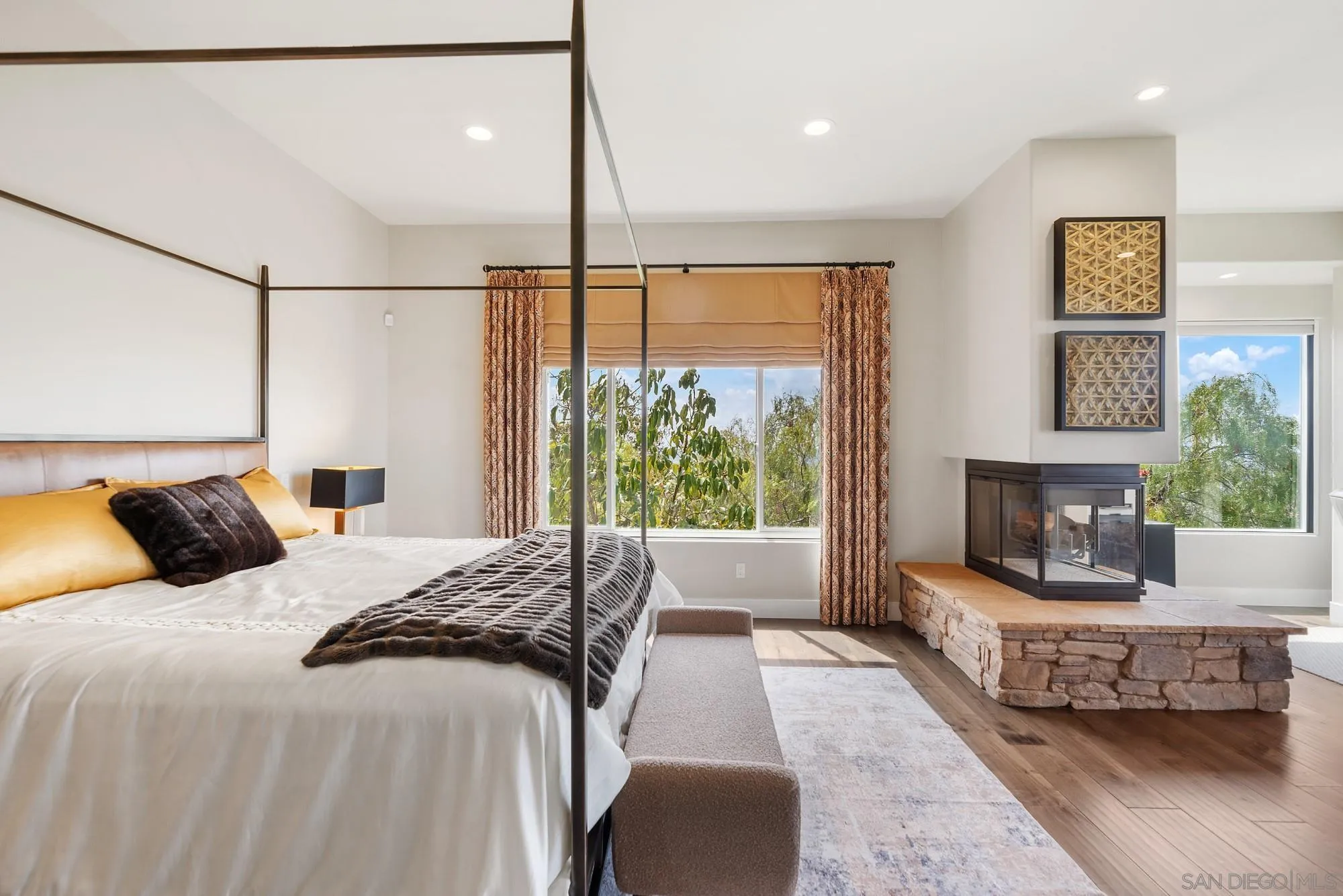 15484 Markar Road Poway, CA 92064 - Photo 25 of 75 a bedroom with a large bed and a large window