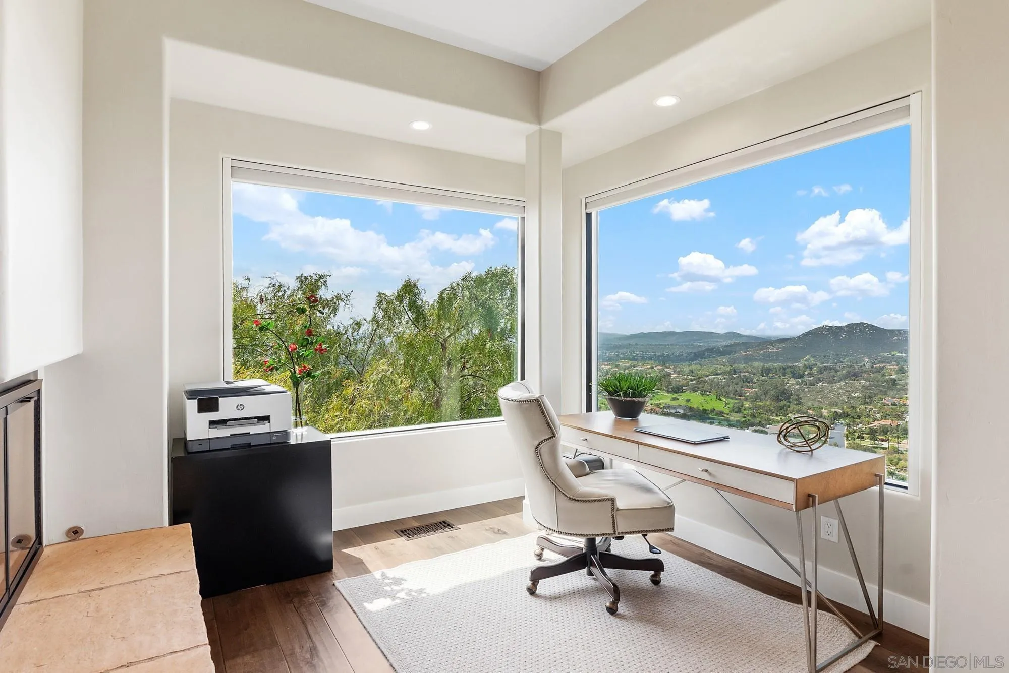 15484 Markar Road Poway, CA 92064 - Photo 27 of 75 a view of a workspace with furniture and a window