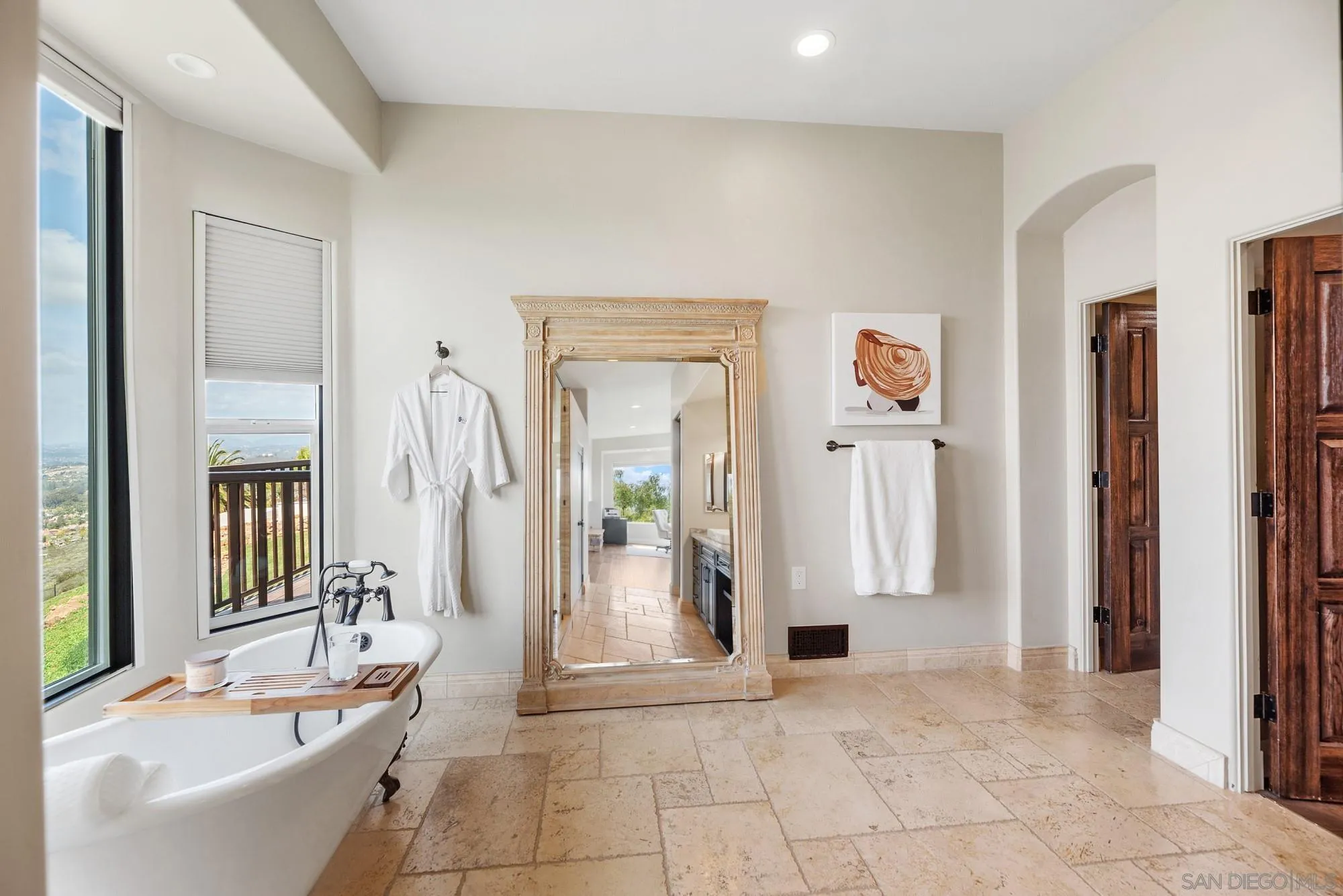 15484 Markar Road Poway, CA 92064 - Photo 30 of 75 a bathroom with a tub sink and mirror