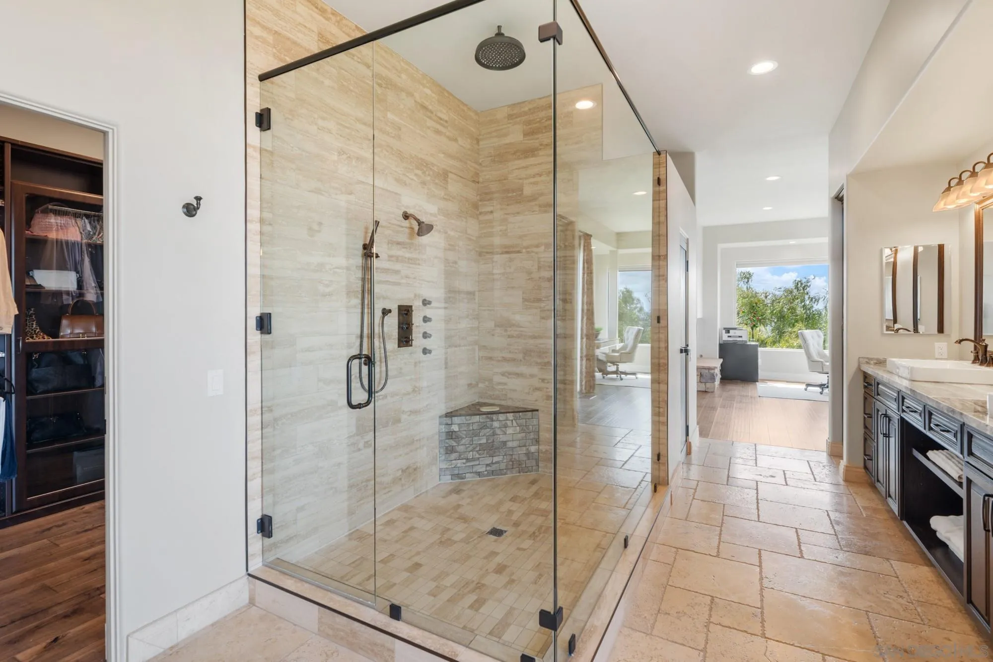 15484 Markar Road Poway, CA 92064 - Photo 32 of 75 a bathroom with a glass shower door and a sink