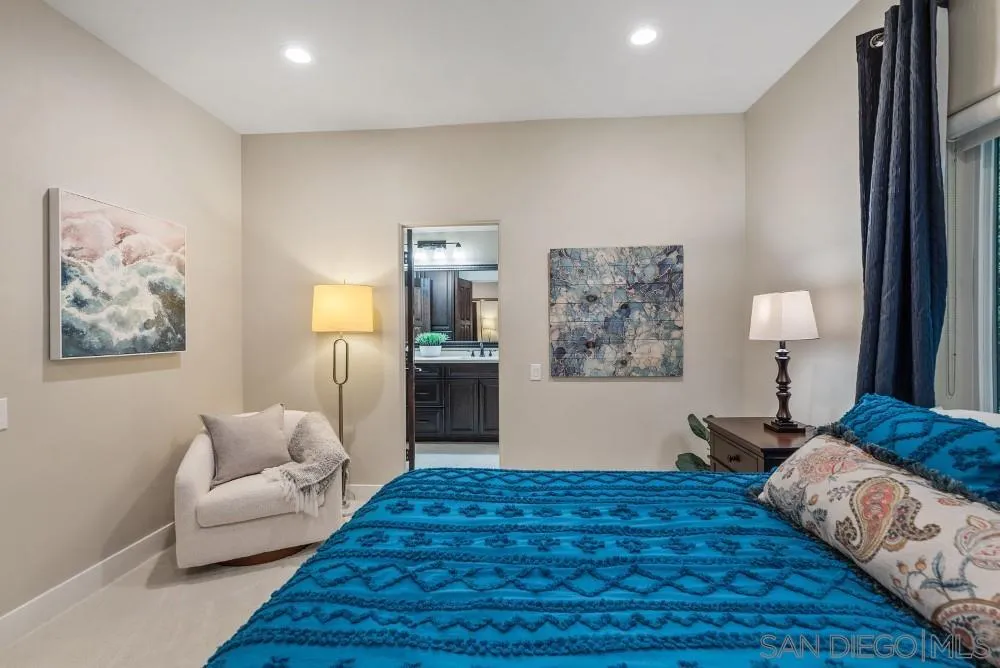 15484 Markar Road Poway, CA 92064 - Photo 36 of 75 a bedroom with a bed and a couch