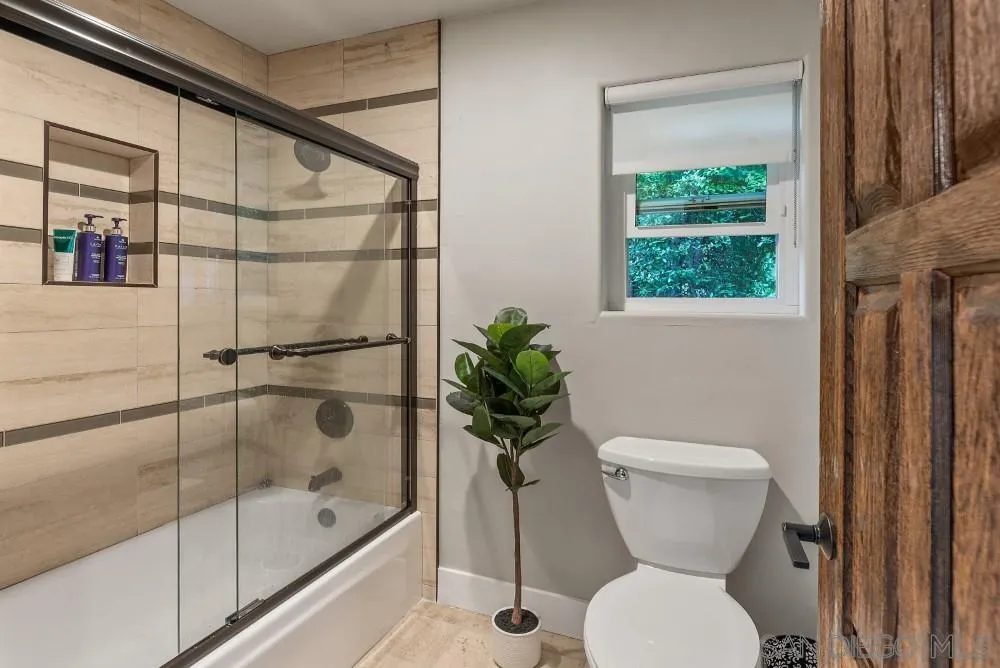 15484 Markar Road Poway, CA 92064 - Photo 39 of 75 a bathroom with a toilet and a shower