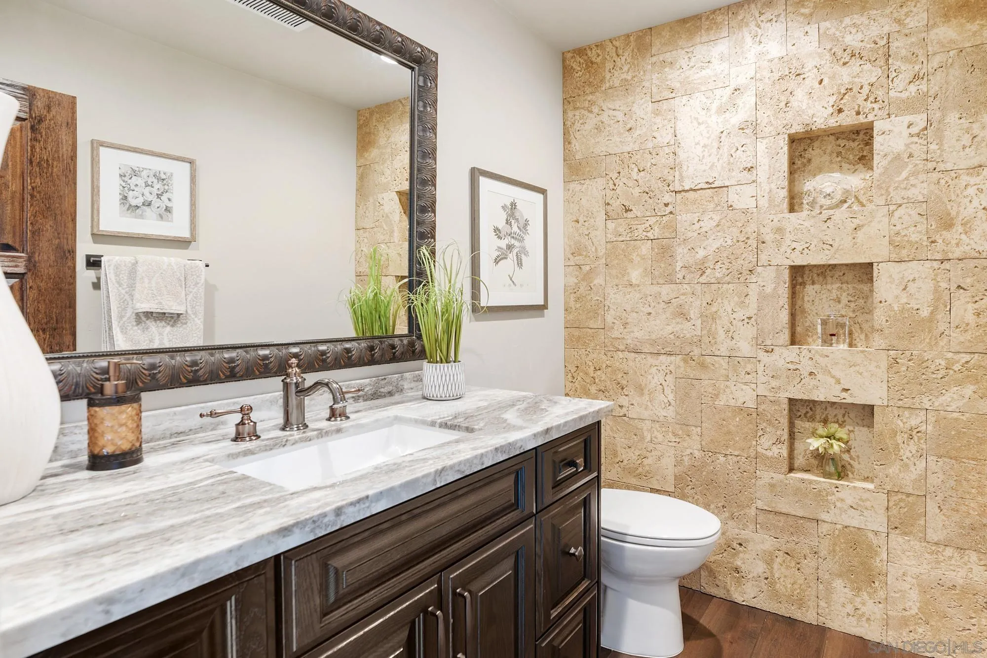 15484 Markar Road Poway, CA 92064 - Photo 47 of 75 a bathroom with a granite countertop toilet sink and mirror