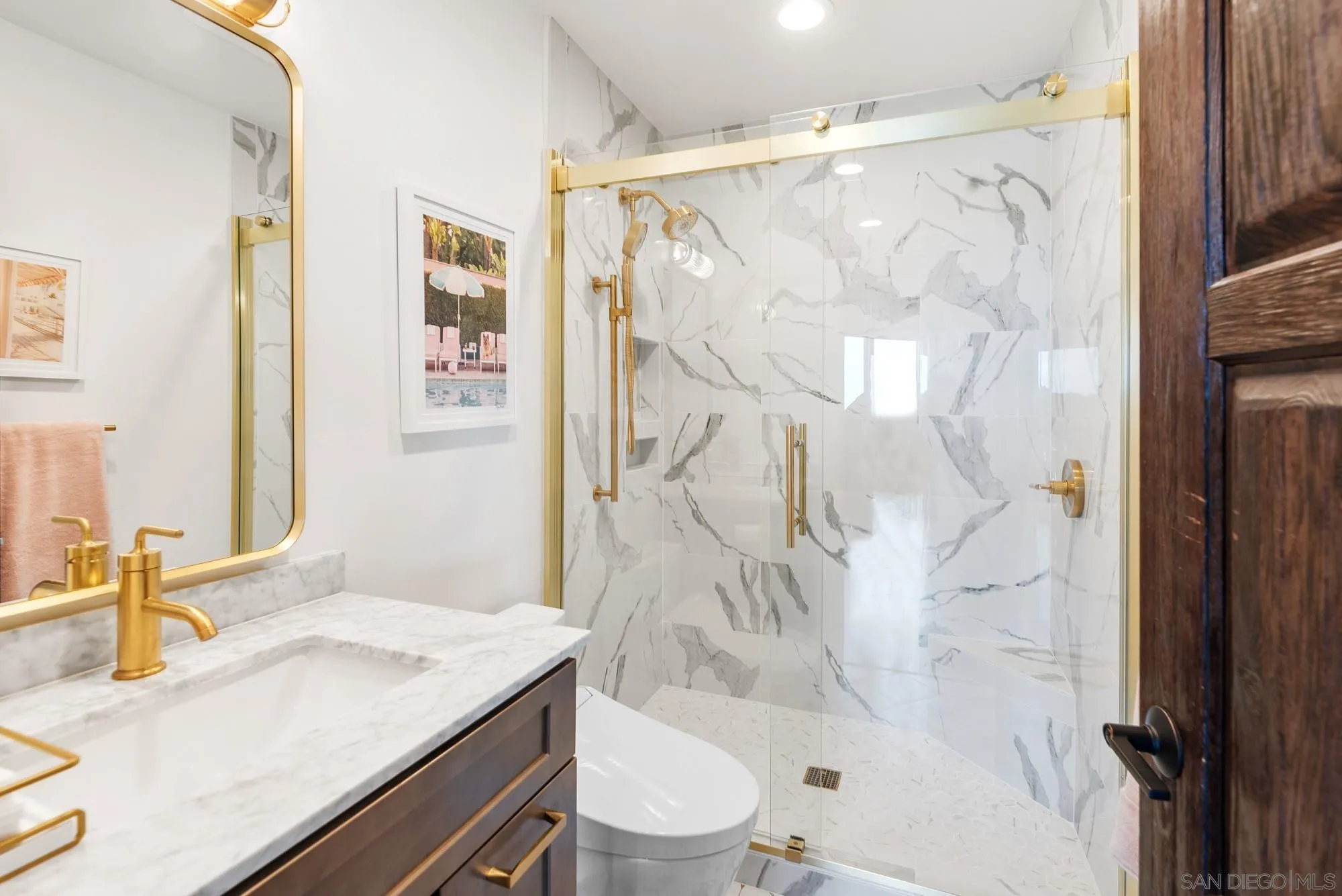 15484 Markar Road Poway, CA 92064 - Photo 52 of 75 a bathroom with a granite countertop sink toilet and shower