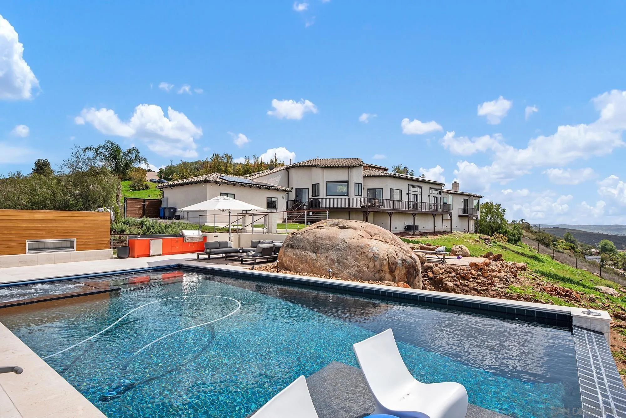 15484 Markar Road Poway, CA 92064 - Photo 60 of 75 a view of swimming pool with outdoor seating