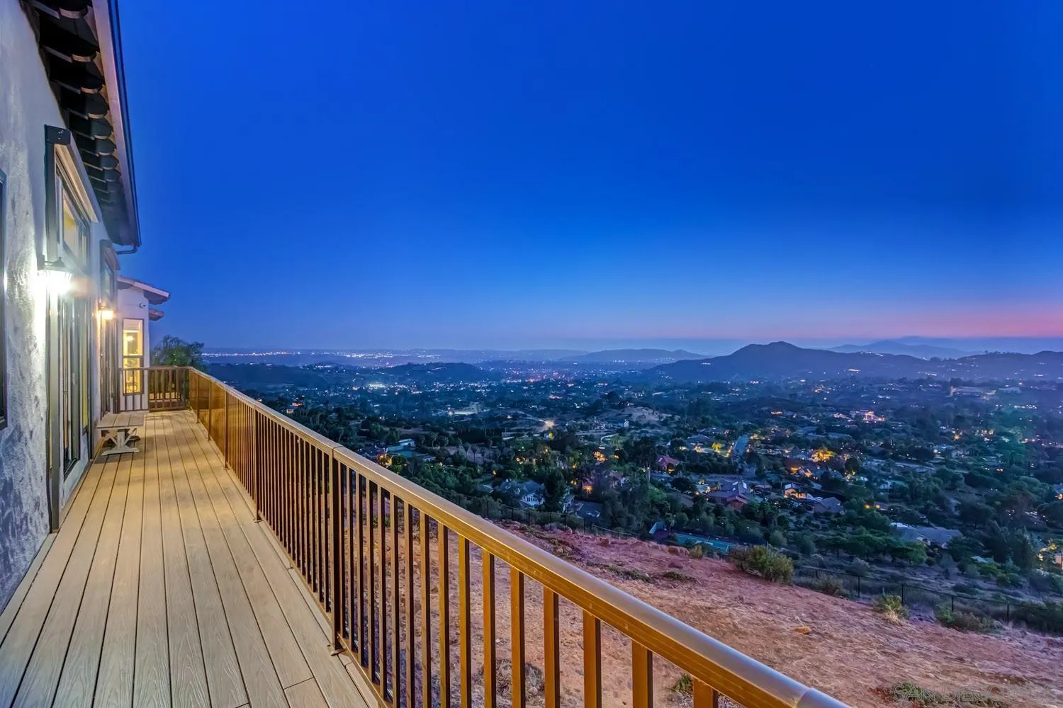 15484 Markar Road Poway, CA 92064 - Photo 70 of 75 a view of a balcony with wooden floor and city view