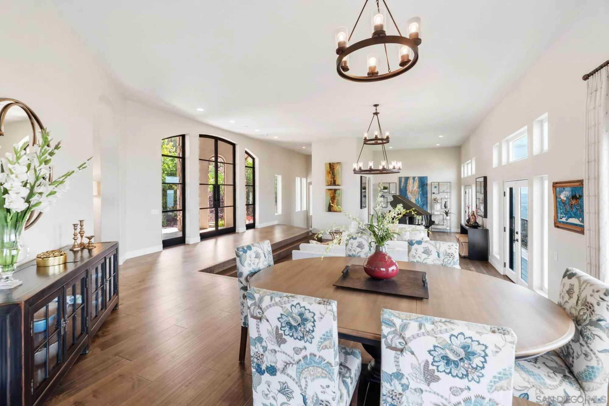 15484 Markar Road Poway, CA 92064 - Photo 10 of 75 a living room with furniture chandelier and a chandelier