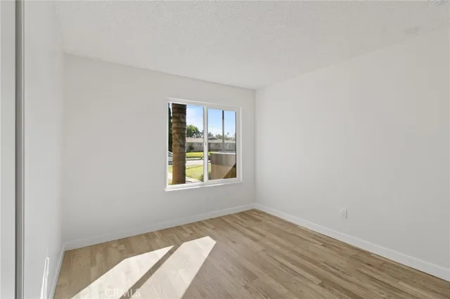 a view of a room that has a window in it