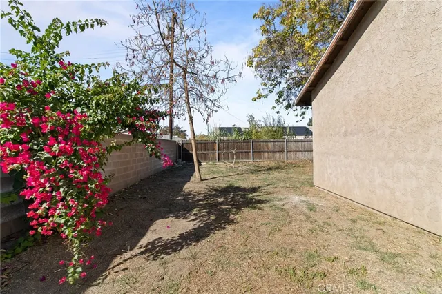 a view of backyard with green space