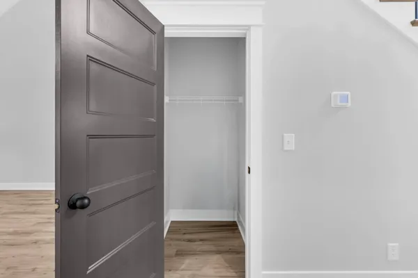 a bathroom with a glass shower door