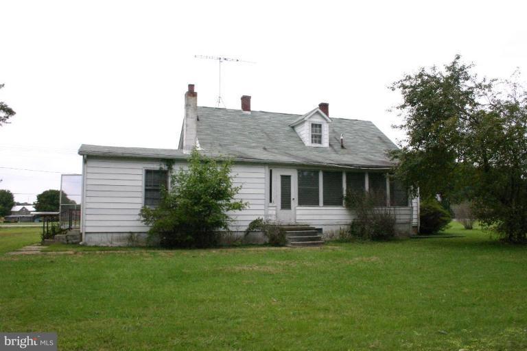 17648 Three Notch Road Dameron, MD 20628 - Photo 4 of 18 a front view of house with garden