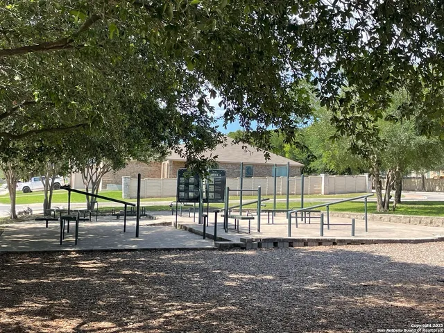 a view of a yard and a street