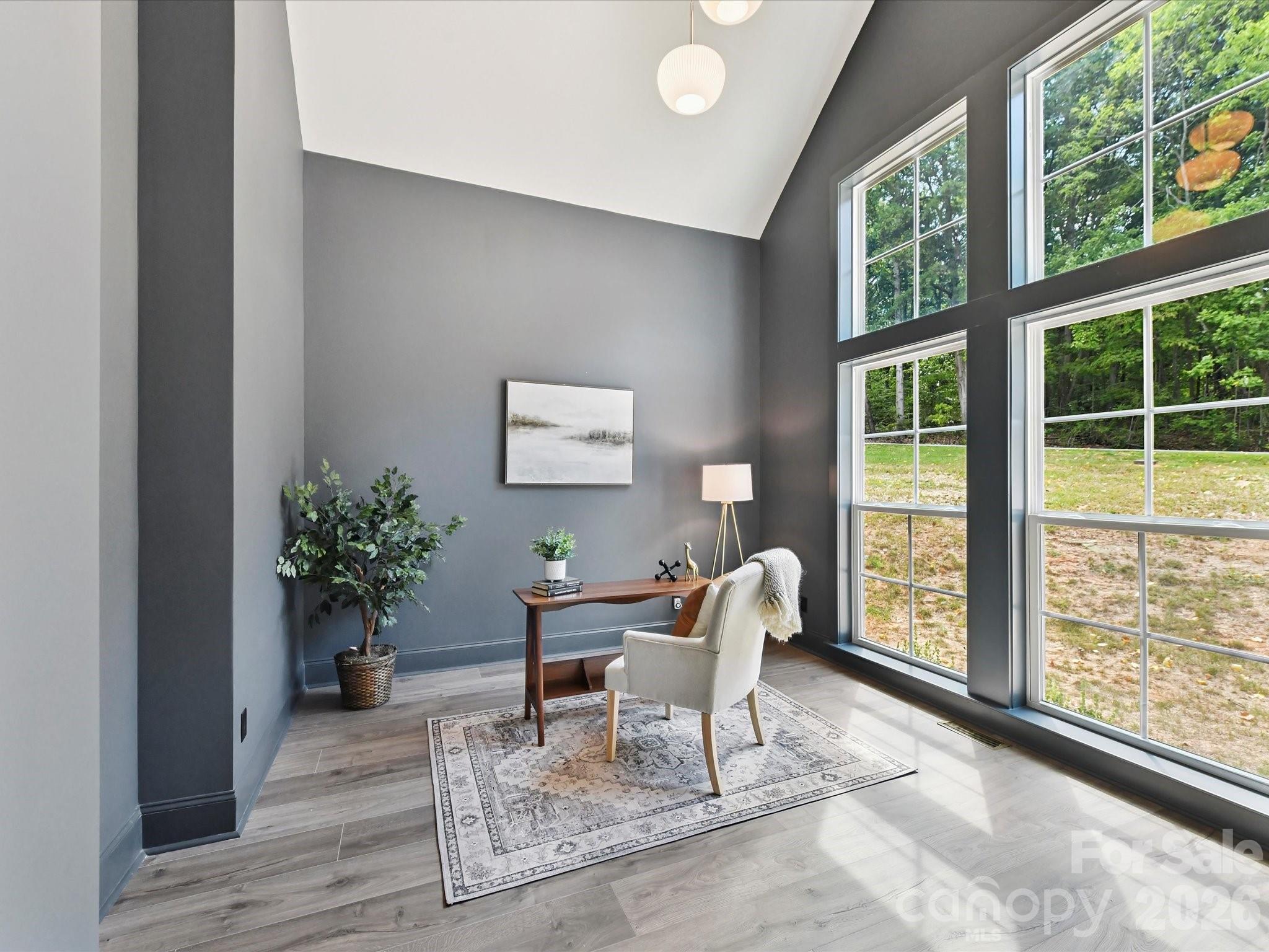 3830 Mill Run Terrell, NC 28682 - Photo 4 of 39 a living room with furniture and a potted plant