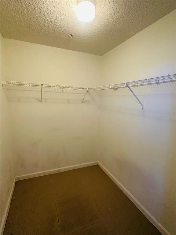 5560 Metrowest Boulevard, Unit 101 Orlando, FL 32811 - Photo 18 of 30 a view of small space with racks on the wall