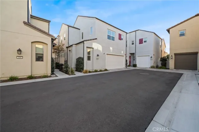 a view of a street with a house