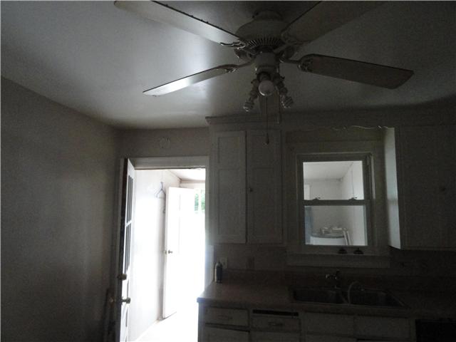 603 Neelys Bend Road Madison, TN 37115 - Photo 5 of 10 a view of hallway and chandelier fan