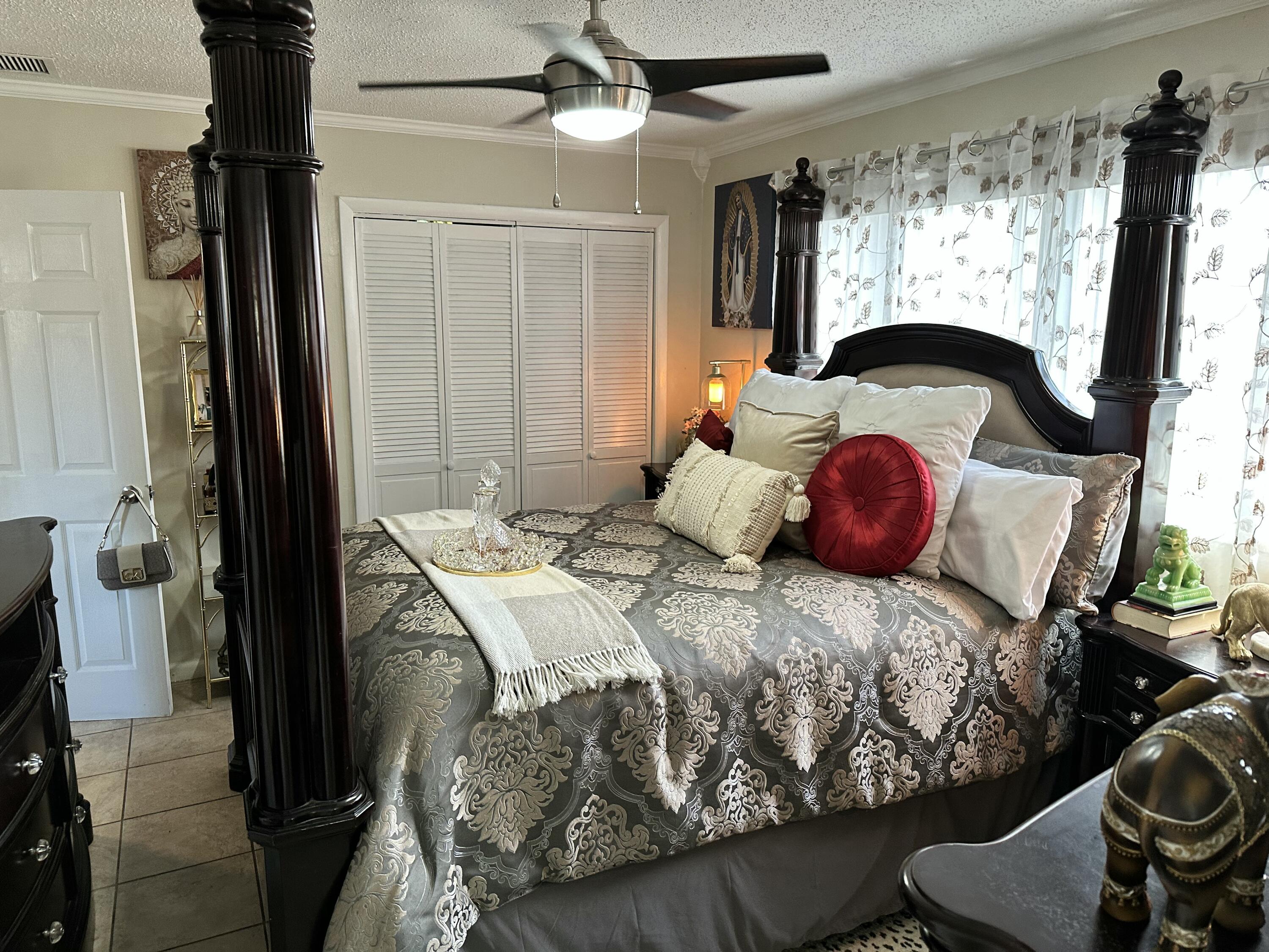 2922 Flagler Avenue Key West, FL 33040 - Photo 18 of 53 a bedroom with a bed and a window