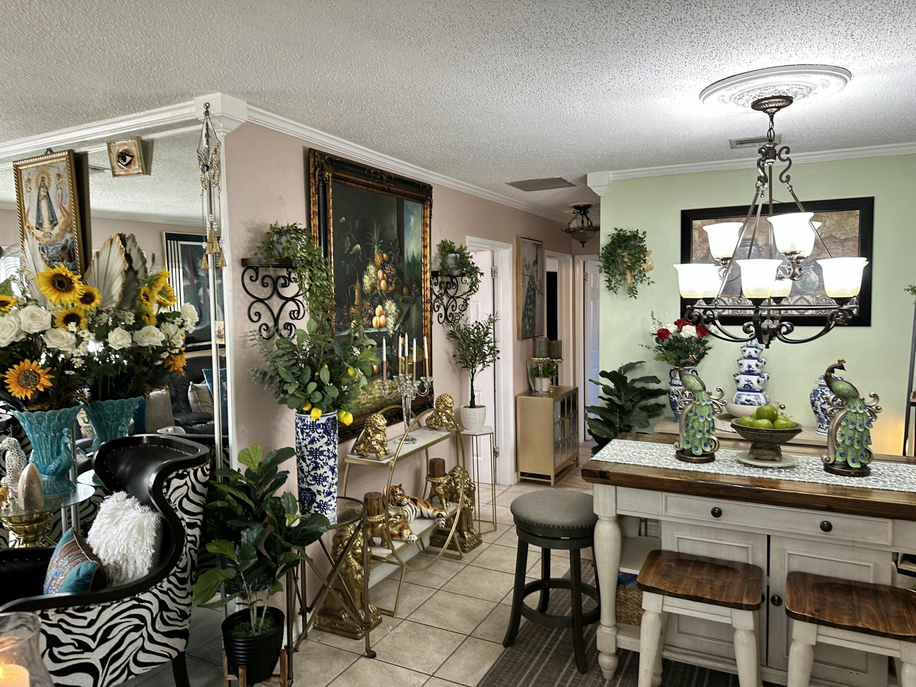 2922 Flagler Avenue Key West, FL 33040 - Photo 24 of 53 a kitchen with a table and chairs in it