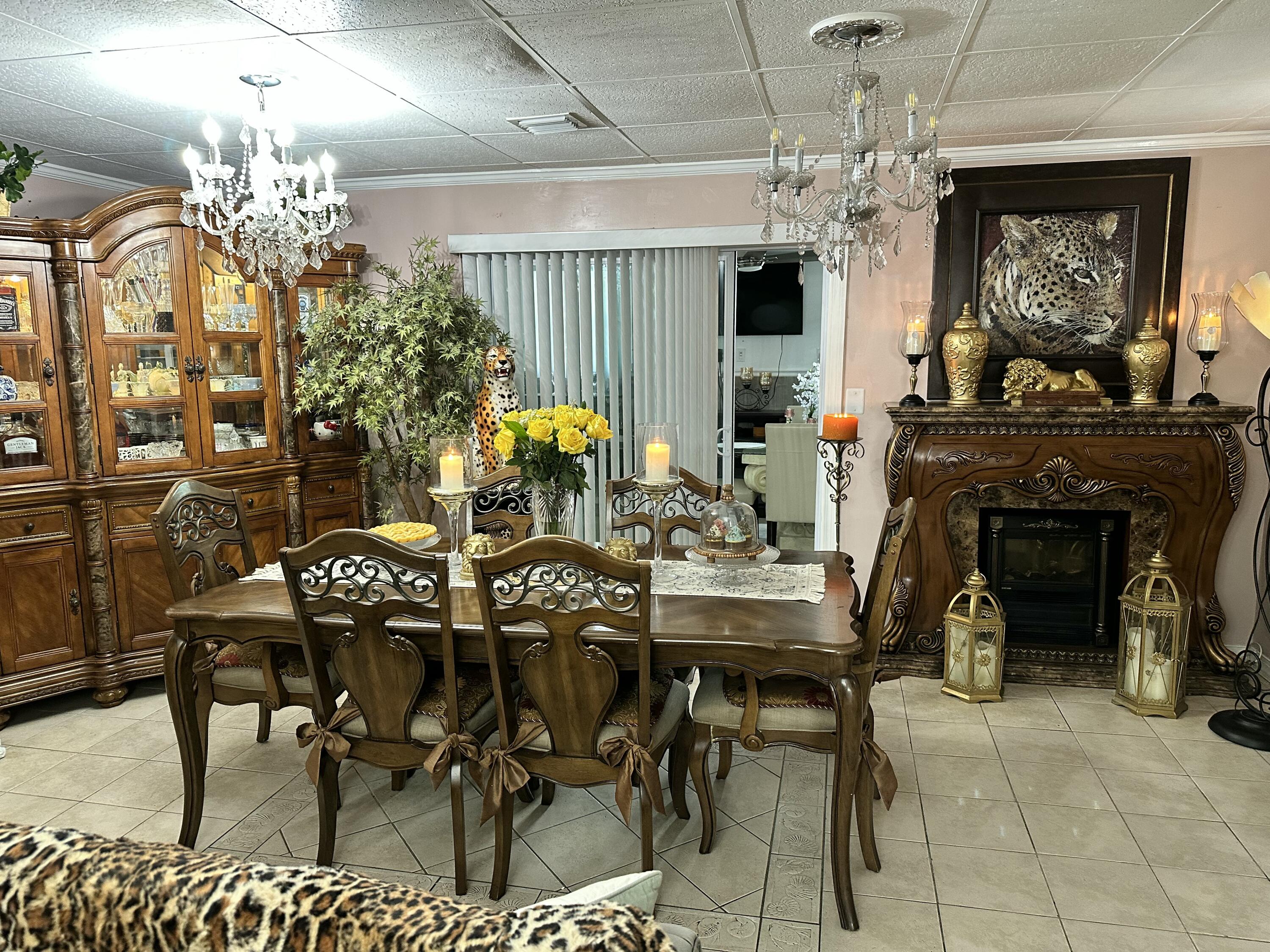 2922 Flagler Avenue Key West, FL 33040 - Photo 3 of 53 a view of a dining room with furniture and chandelier
