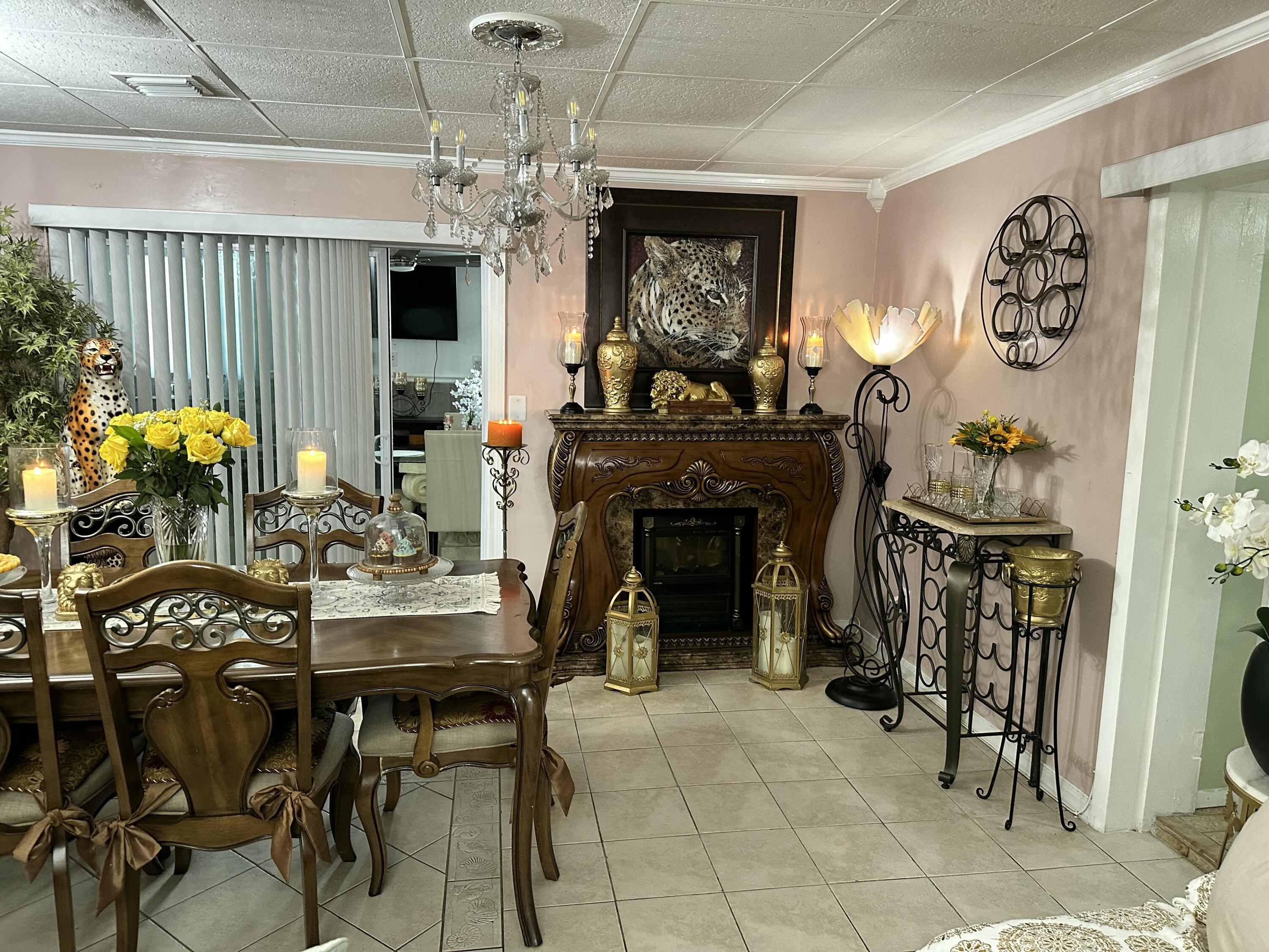 2922 Flagler Avenue Key West, FL 33040 - Photo 34 of 53 a view of a dining room with furniture and chandelier