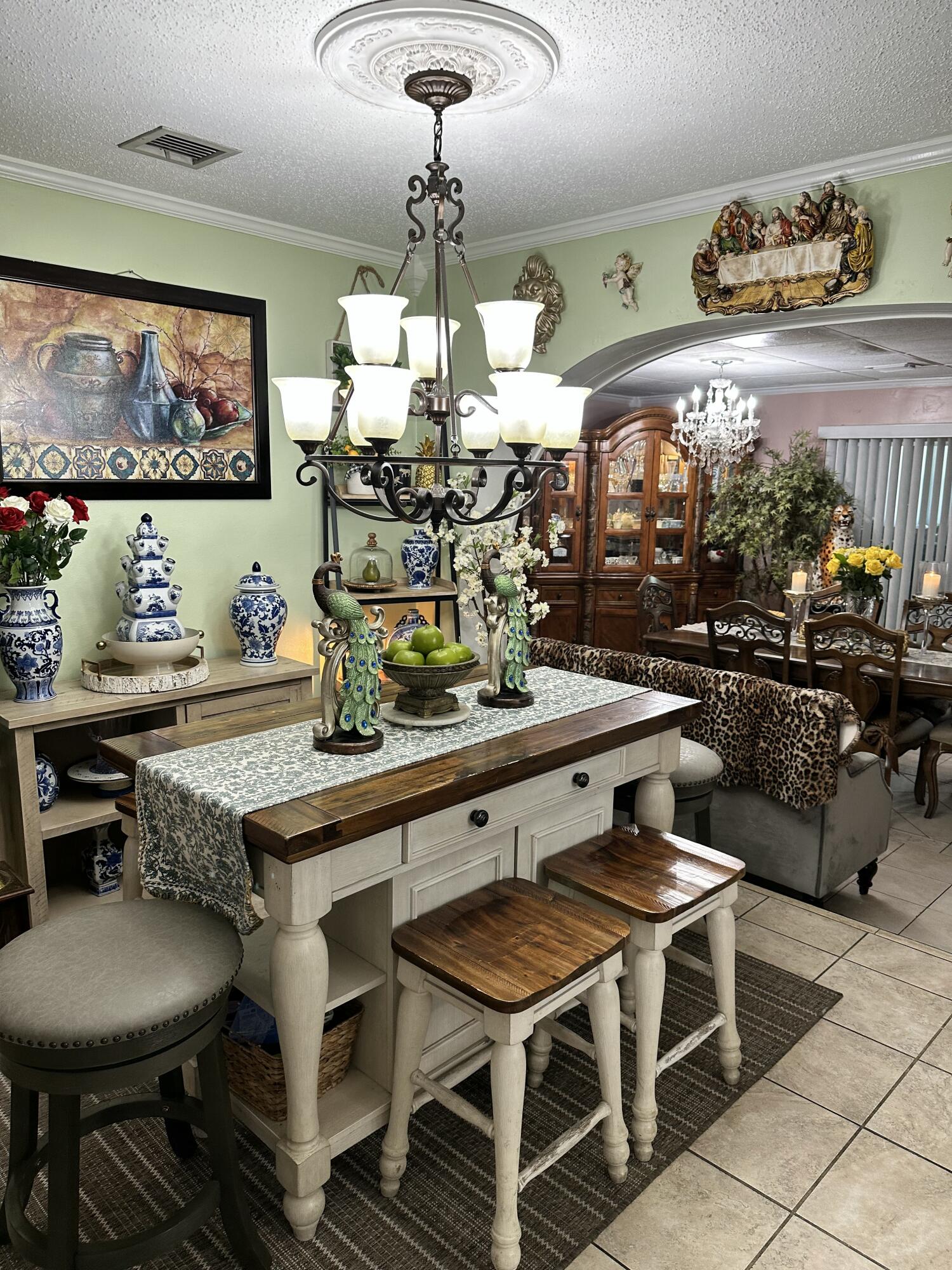 2922 Flagler Avenue Key West, FL 33040 - Photo 39 of 53 a kitchen with a table and chairs in it