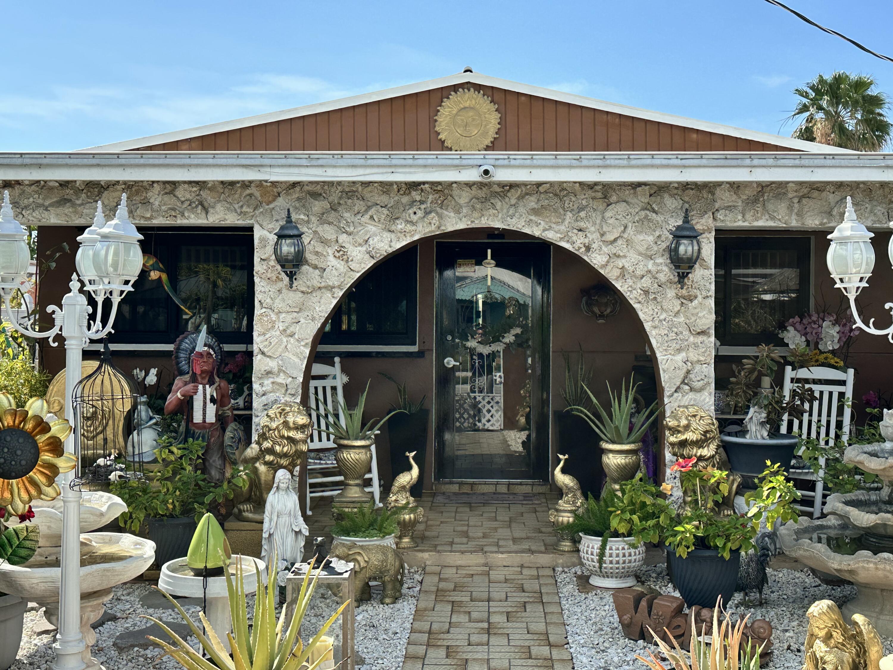 2922 Flagler Avenue Key West, FL 33040 - Photo 53 of 53 a front view of a house with outdoor seating