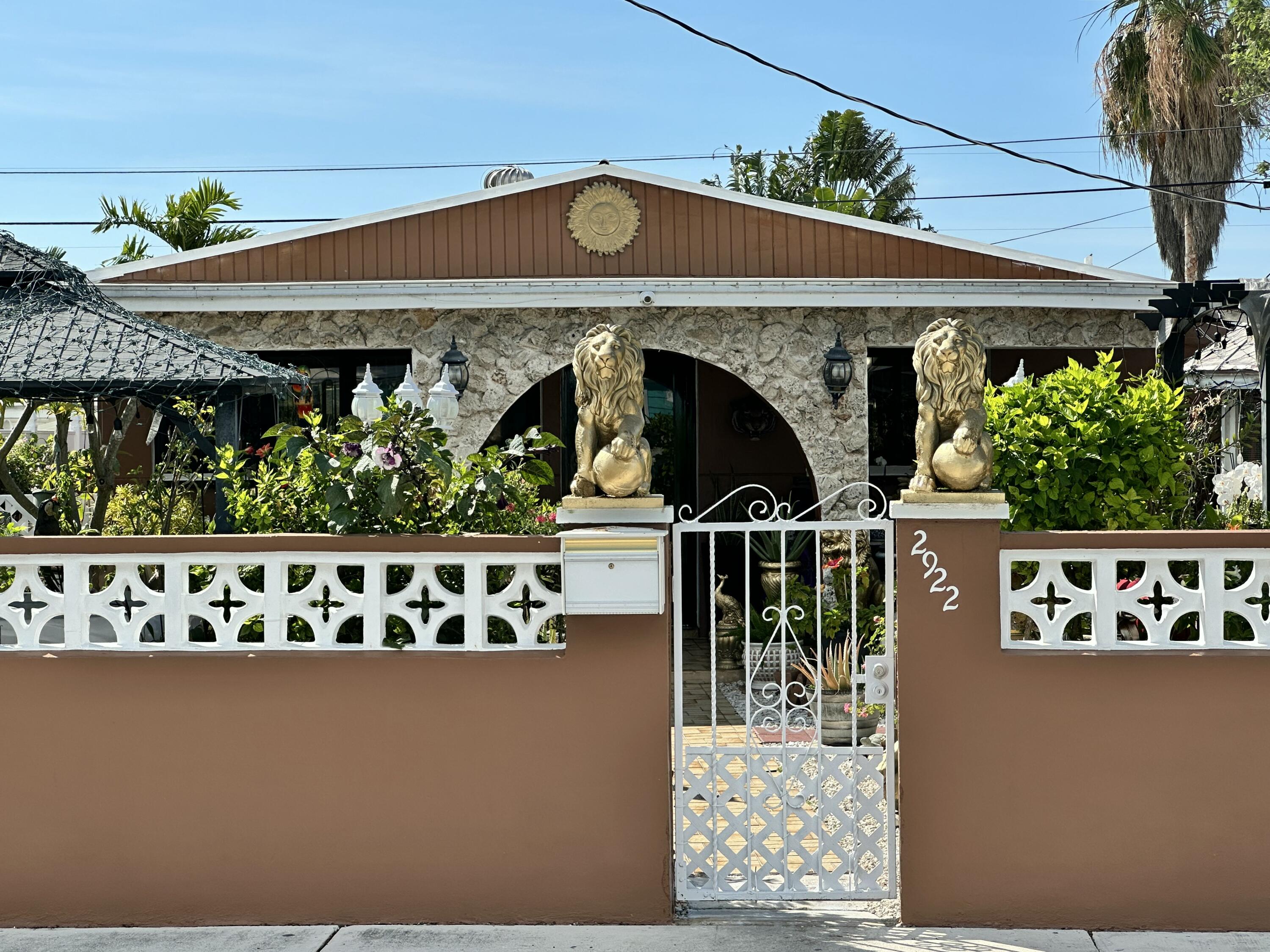 2922 Flagler Avenue Key West, FL 33040 - Photo 7 of 53 a front view of a house with garden