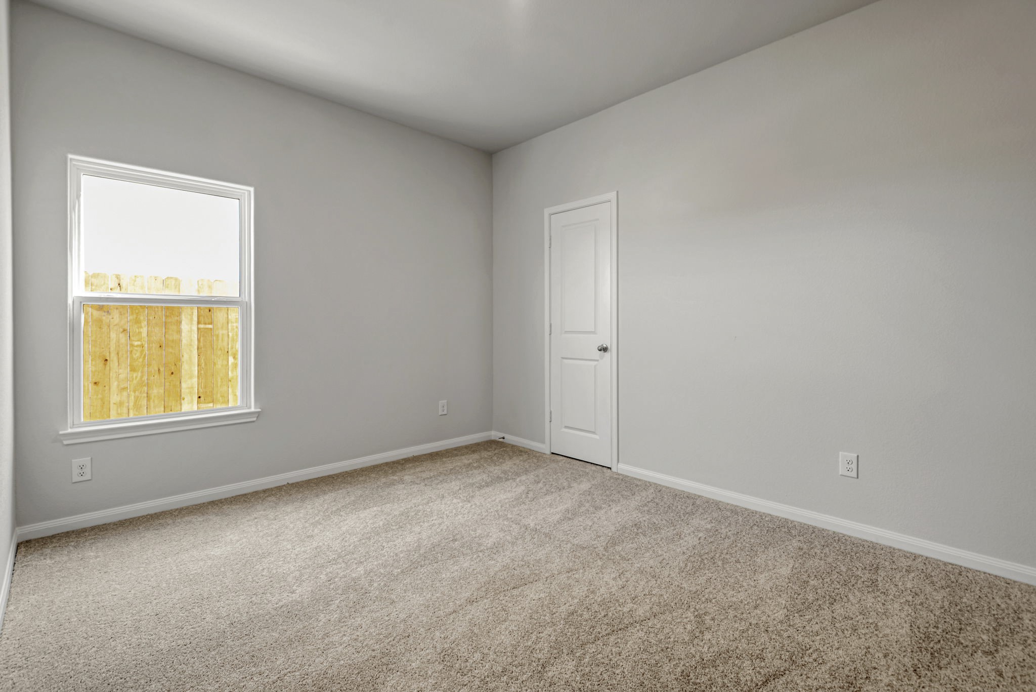 6419 Winter Elm Street Houston, TX 77048 - Photo 5 of 7 an empty room with a window