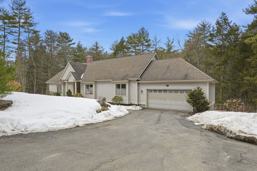 16 North Valley Road Pelham, MA 01002 - Photo 2 of 41 a white house with a large tree in front of it