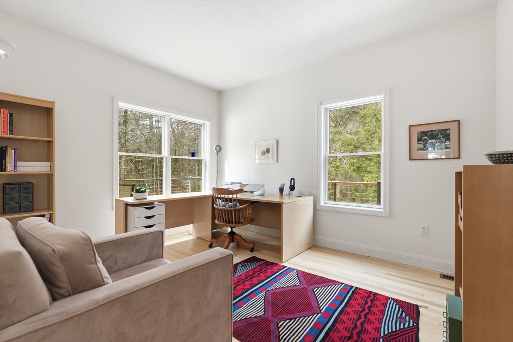 16 North Valley Road Pelham, MA 01002 - Photo 22 of 41 a living room with furniture and a window