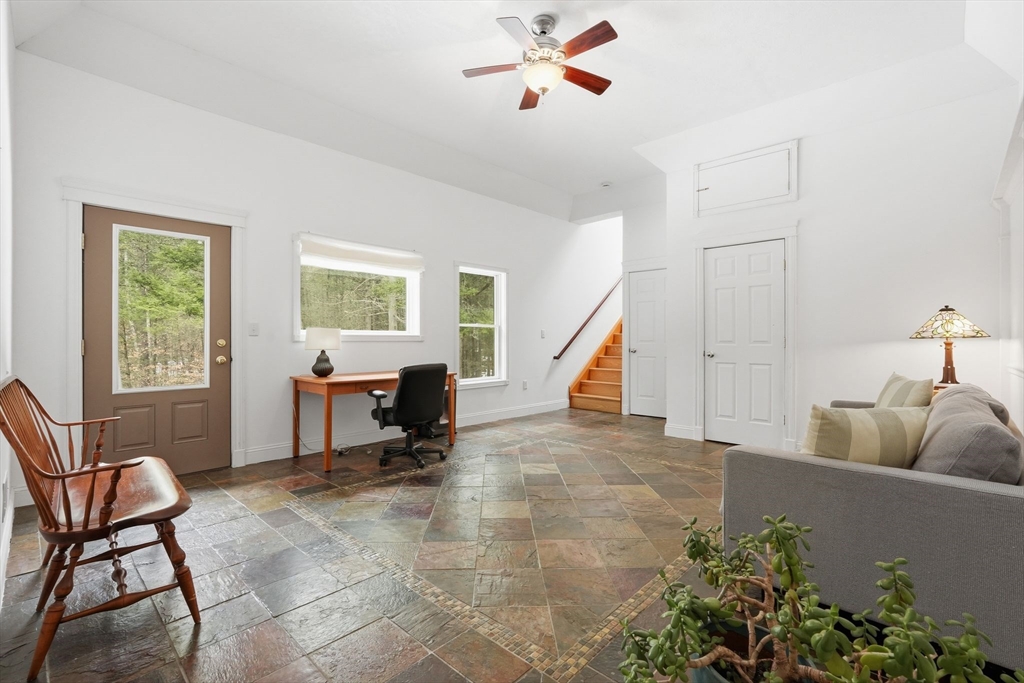 16 North Valley Road Pelham, MA 01002 - Photo 28 of 41 a living room with furniture and a window