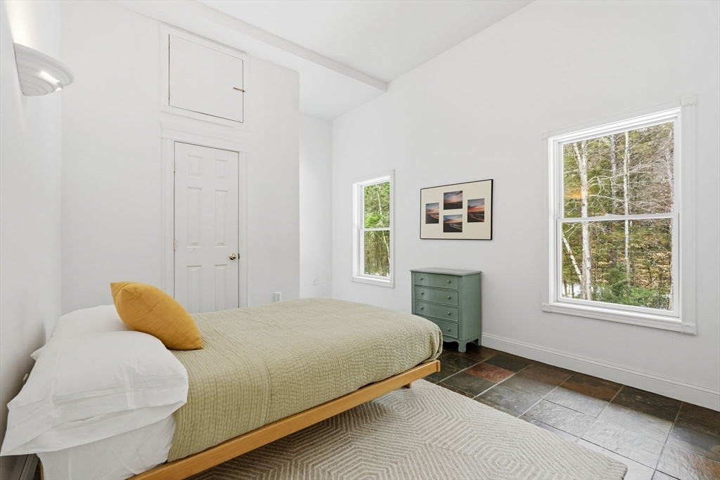 16 North Valley Road Pelham, MA 01002 - Photo 29 of 41 a bedroom with a bed and a window