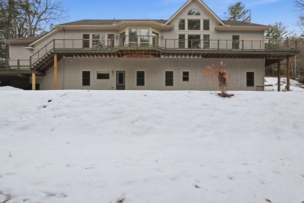 16 North Valley Road Pelham, MA 01002 - Photo 37 of 41 a big white house with a large tree in front of it