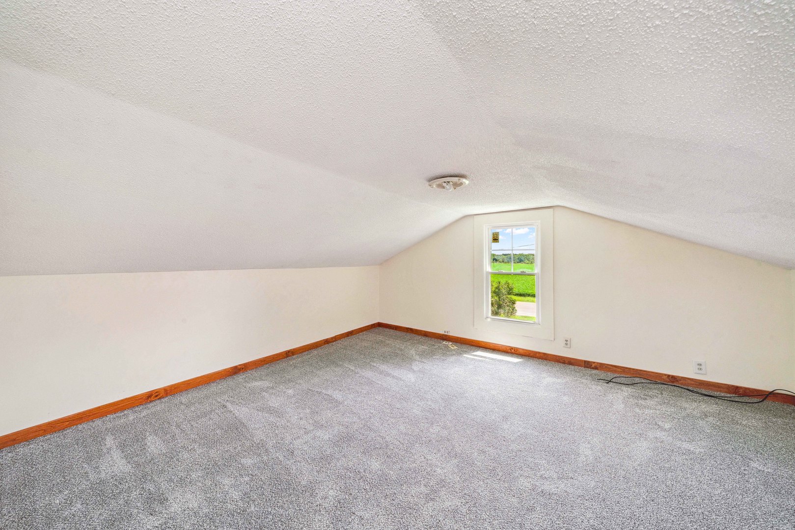 15589 Chicago Road Sandwich, IL 60548 - Photo 11 of 30 an empty room with a window
