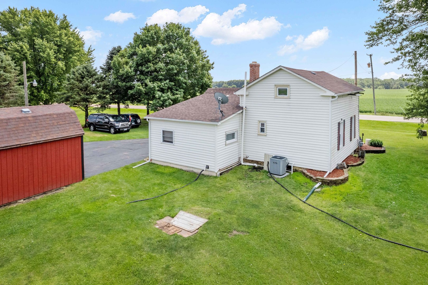 15589 Chicago Road Sandwich, IL 60548 - Photo 21 of 30 a view of a backyard with a garden