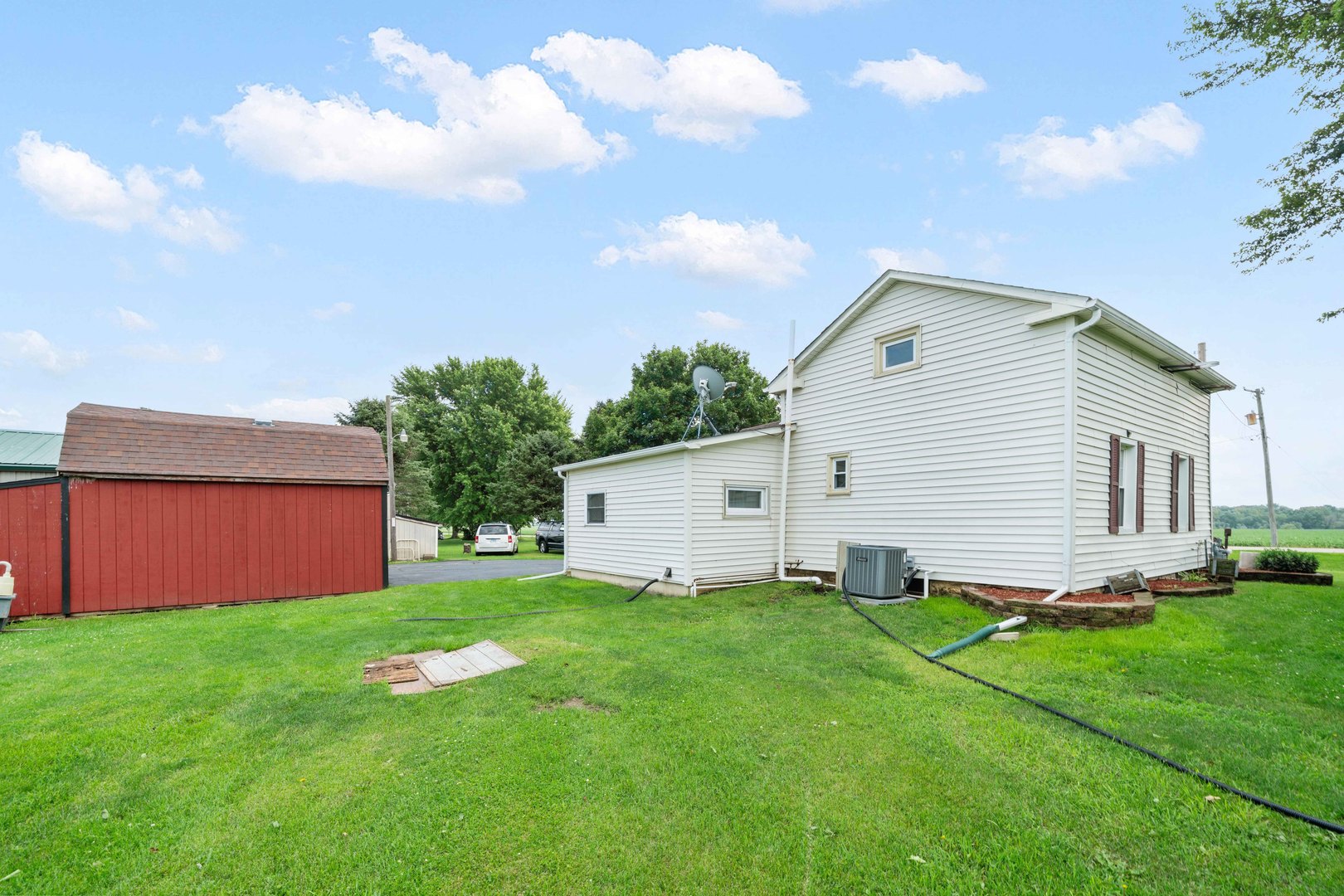 15589 Chicago Road Sandwich, IL 60548 - Photo 22 of 30 a view of a house with backyard