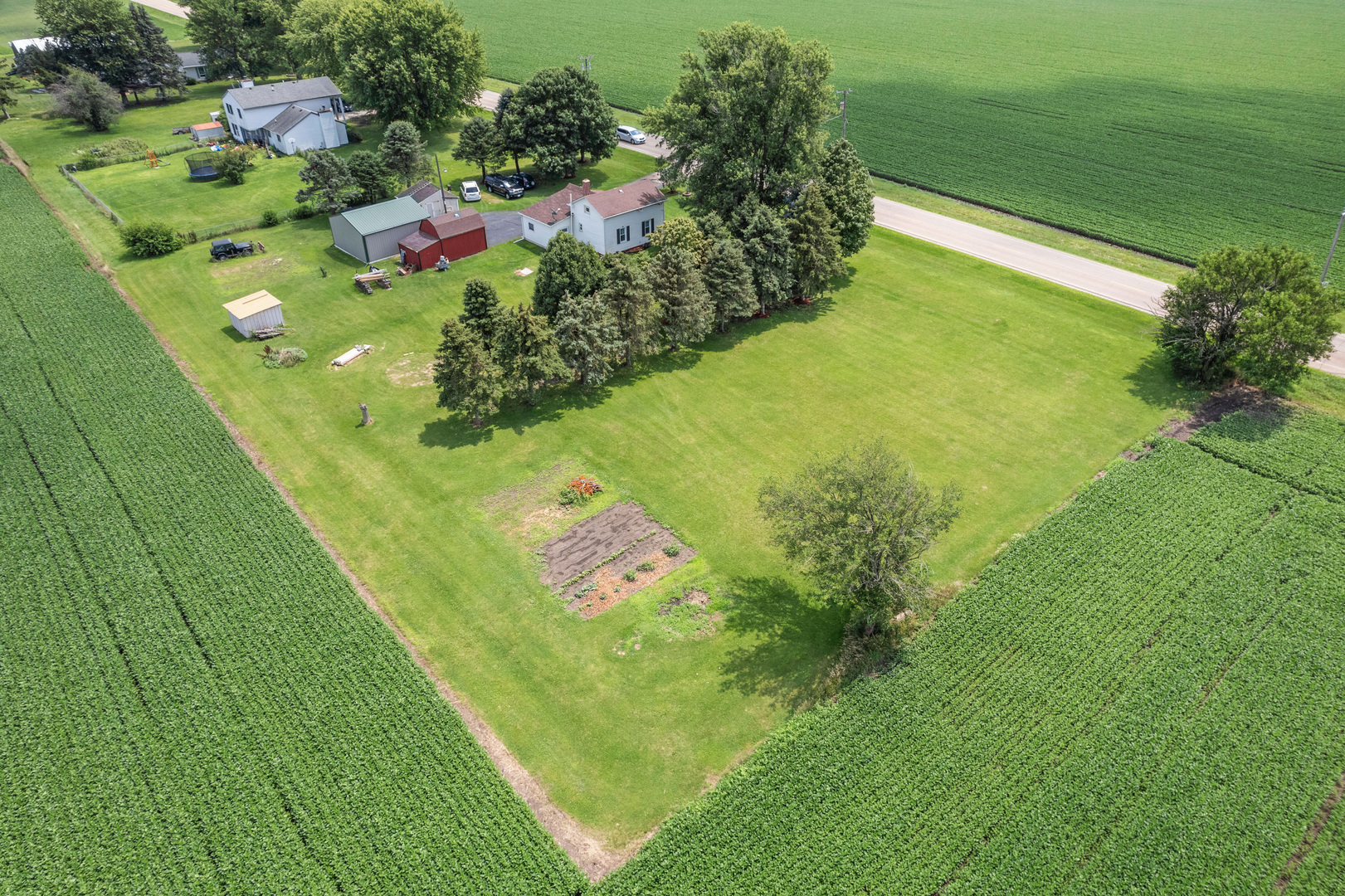 15589 Chicago Road Sandwich, IL 60548 - Photo 26 of 30 a view of a garden with plants